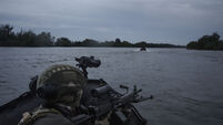 Ukrainian troops work to advance on Russian-held side of key river