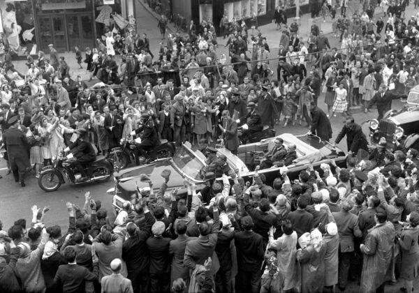 John F Kennedy is driven through St Patrick's St in an open-top car with Lord Mayor Sean Casey, during his visit to Cork. File picture