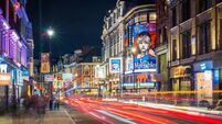 London Shaftesbury Avenue West End theatre district illuminated nightlife panorama