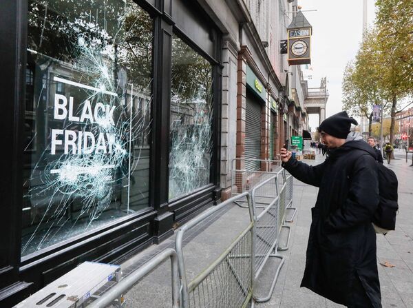 Damage to Asics on O'Connell St as the clean-up operation got under way in Dublin on Thursday. Picture: RollingNews.ie