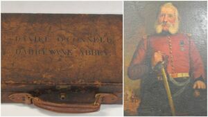 Daniel O'Connell's gun case and general's portrait in the frame 