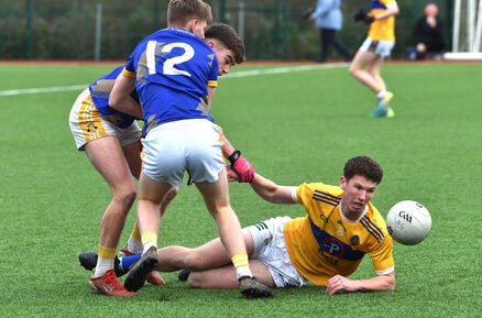  Tralee CBS players Jake Foley and Liam Óg O Connor getting in a tackle on Paul Kelly, Hamilton High School, Bandon. Pic: Dan Linehan