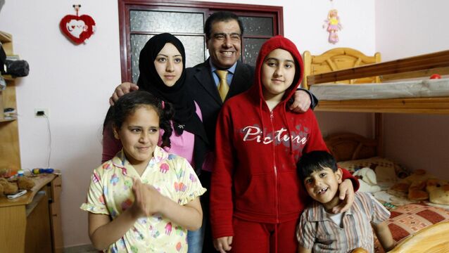 <p class="contextmenu internal_Caption">In this photo taken on Thursday, May 7, 2009, Palestinian Dr Izzeldin Abuelaish poses with his children in his house in Jebaliya, northern Gaza Strip. That same year, two Israeli tank shells slammed into his home, killing three of his daughters. But he found the strength to go on.</p>