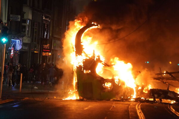 A bus on fire on O'Connell Street in Dublin city centre.