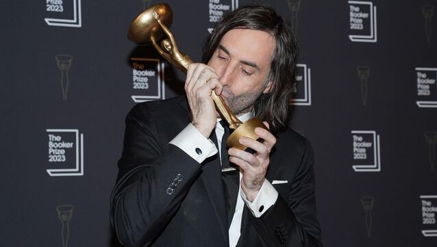 <p>Paul Lynch kisses the trophy after being named as the winner of the 2023 Booker Prize for the novel Prophet Song, at an award ceremony in Old Billingsgate, London.</p>