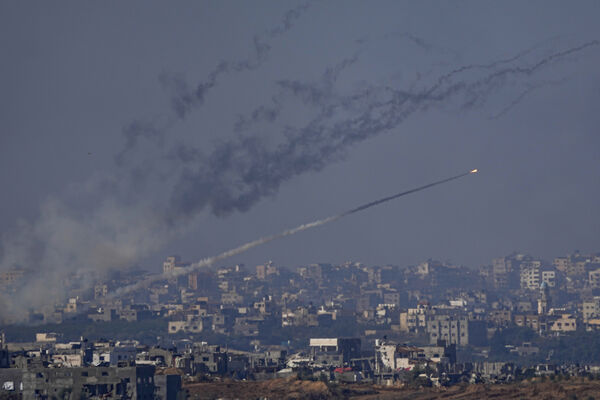 Rockets are fired toward Israel from the Gaza Strip, as seen from southern Israel on Friday.(Picture: AP Photo/Ariel Schalit)